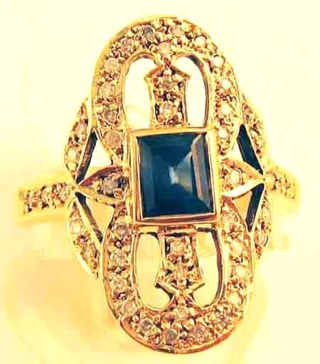 Splendid Diamonds and Blue sapphire in 9 Carat Yellow Gold Ring-