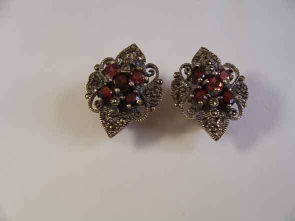 A pair of Sterling Silver, Marcasite and Genuine Garnet Earrings.