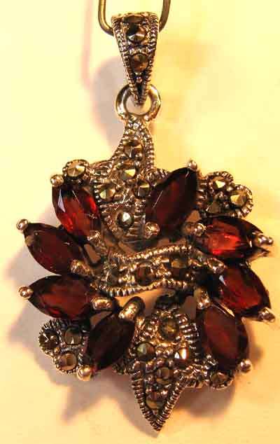 Splendid Sterling Silver , Marcasite and Genuine Garnets Pendant