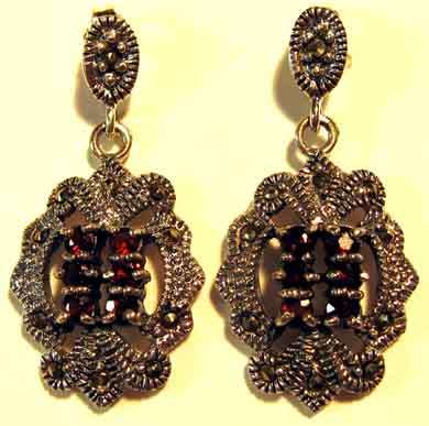 PRETTY, A PAIR OF SOLID SILVER, MARCASITE AND GARNETS  EARRINGS.