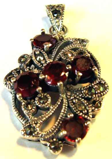 Pretty Silver, Marcasite and Garnet Pendant.