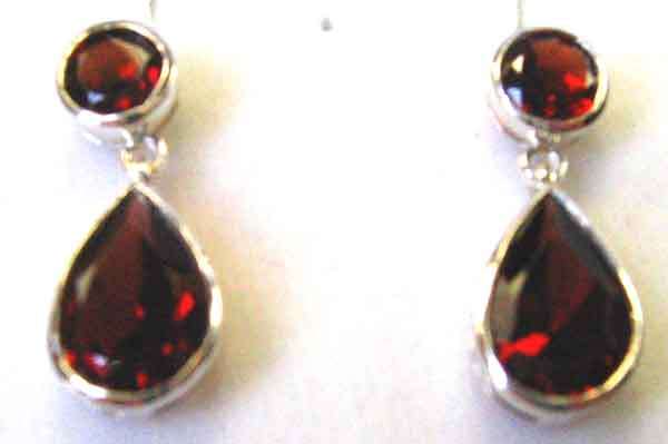 A pair of genuine Sterling Silver and Garnets Earrings.