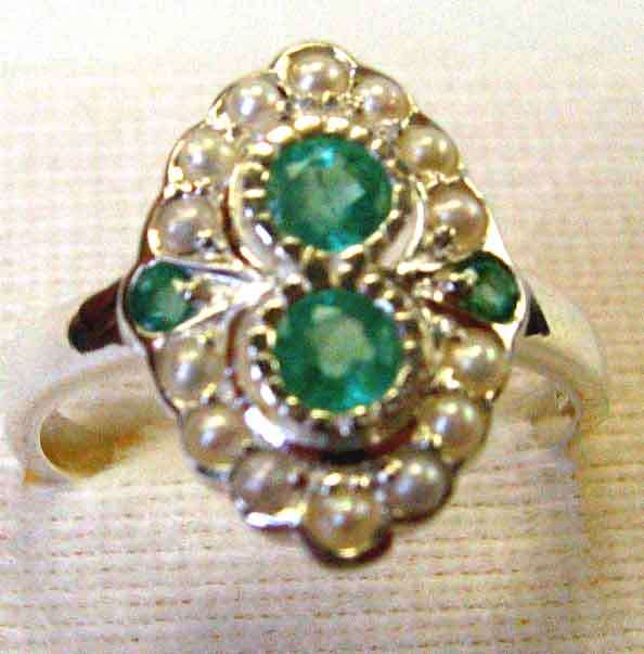 Stunning Emeralds and Pearl Ring.