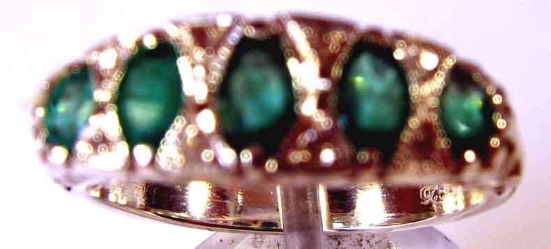 Lovely Sterling Silver with Genuine Emeralds and Diamonds Ring.