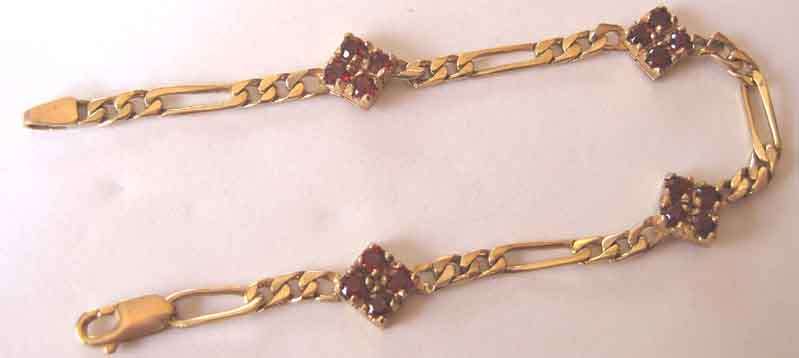 Solid 9K Gold and Garnets Bracelet.