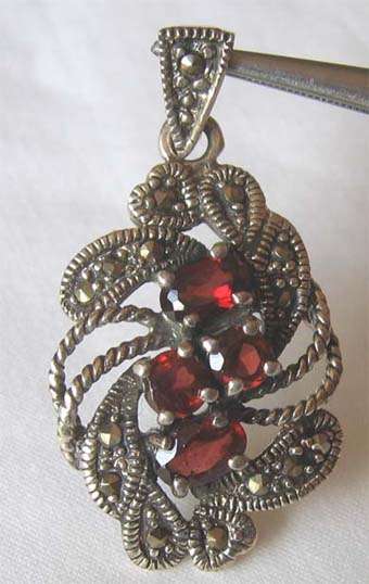 Sterling Silver , Marcasite and Genuine Garnet s  Pendant.