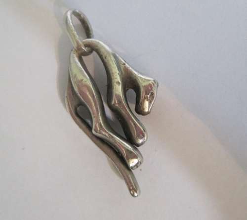 Awesome heavy silver slouching leopard pendant