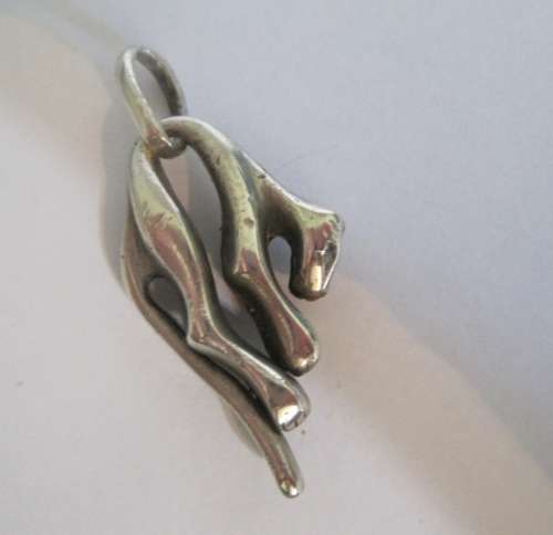 Awesome heavy silver slouching leopard pendant