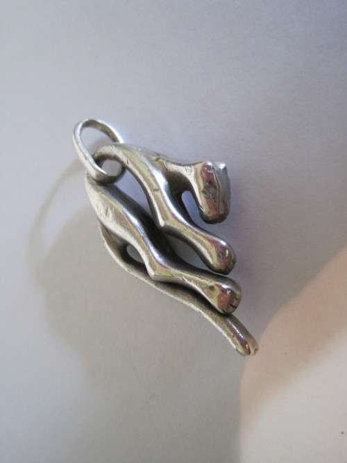 Awesome heavy silver slouching leopard pendant