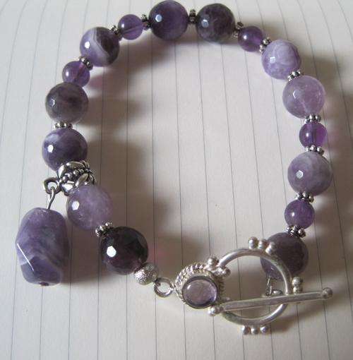 Amazing Amethyst, faceted and smooth, with matching clasp