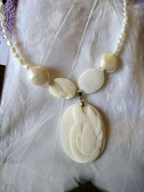 Mother-of-pearl carved swan pendant, on pearls and MOP. Unique.