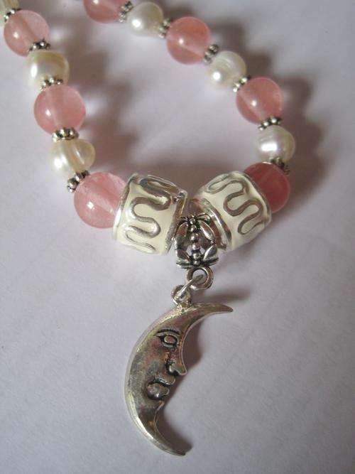 Strawberry Quartz, Freshwater pearls, and a 925 silver moon pendant!
