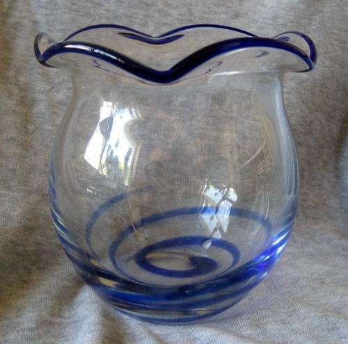 Clear glass, with blue swirl and rim - lovely!