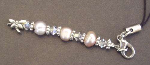 Delighful pale pink freshwater pearl and Swarovski cellphone/bag/zipper charm.