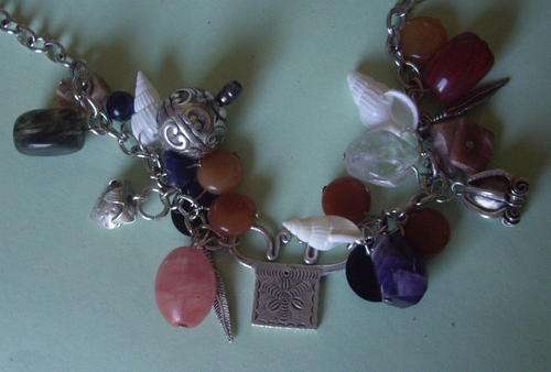 goddess amethyst quartz strawberry shell feather smokey carnelian agate 