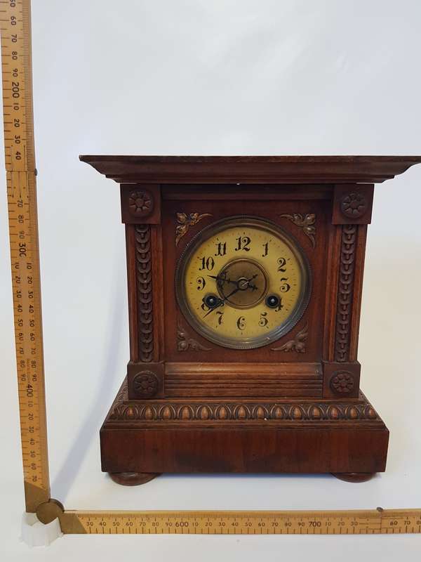 antique wooden mantel clock