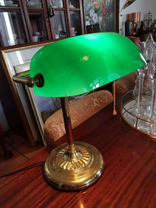 Brass and Emerald Green Glass Shade Bankers Desk Lamp with Chain Switch and Swivel Shade.
