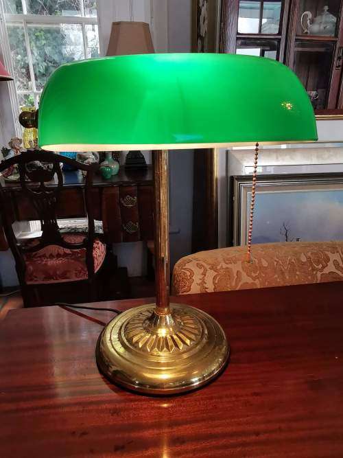 Brass and Emerald Green Glass Shade Bankers Desk Lamp with Chain Switch and Swivel Shade.