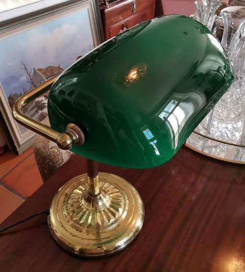 Brass and Emerald Green Glass Shade Bankers Desk Lamp with Chain Switch and Swivel Shade.