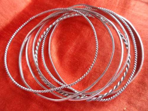 ATTRACTIVE SET OF 7 SILVER BANGLES