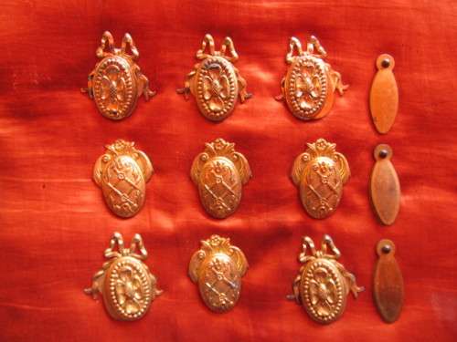 12 ASSORTED METAL AND ORMOLU ESCUTCHEON PLATES