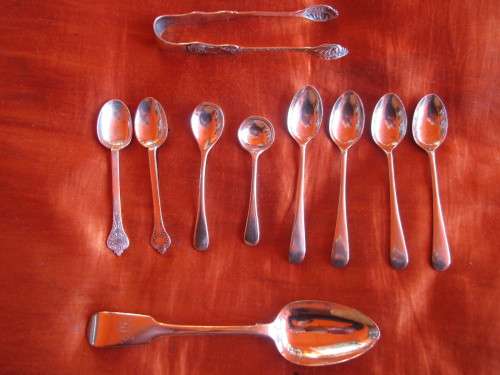 ASSORTED HM SILVER SPOONS AND SUGAR TONGS INCLUDING A GEORGIAN IRISH SPOON
