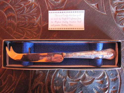 SILVER HANDLED CHEESE KNIFE