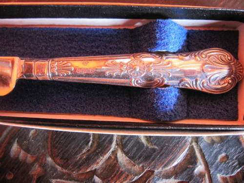 SILVER HANDLED CHEESE KNIFE