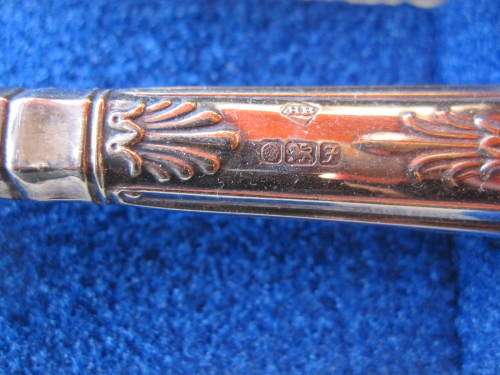 SILVER HANDLED CHEESE KNIFE