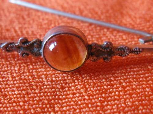 SMALL DAINTY SILVER AND AMBER BROOCH