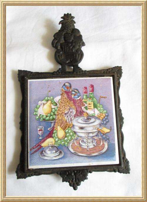 Vintage Footed Cast-Iron Norleans Tile Trivet from Blisful