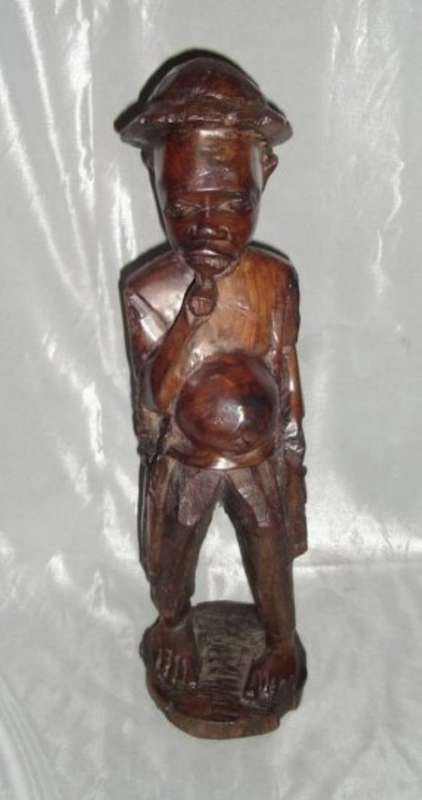 WOODEN hand CARVING OF A MAN from BLISFUL