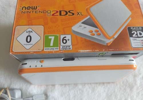 `New` Nintendo 2ds Xl console with original packaging, charger and stylus +free courier