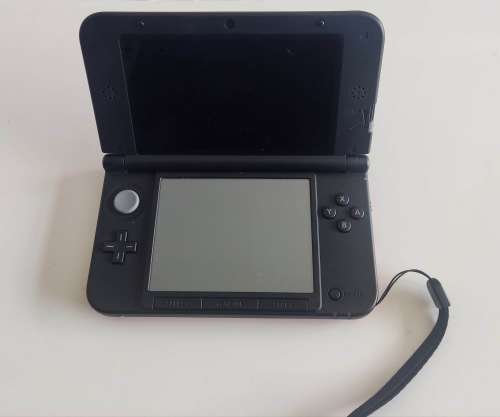 Nintendo 3ds XL console with original charger and stylus