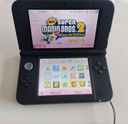 Nintendo 3ds XL console with original charger and stylus