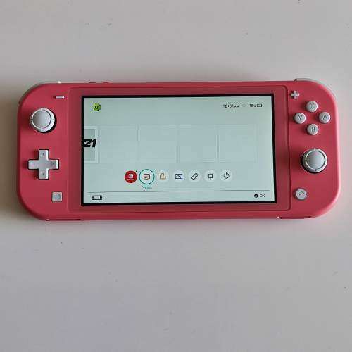 Nintendo switch lite + original charger (coral)
