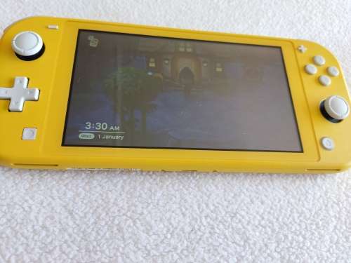 Nintendo Switch lite, charger and original packaging one digital game animal crossing new horizon