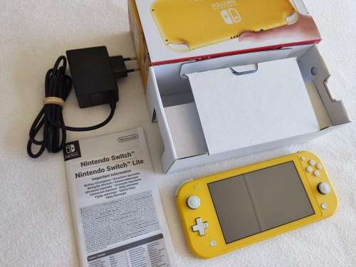 Nintendo Switch lite, charger and original packaging one digital game animal crossing new horizon