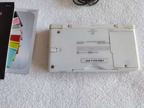 Nintendo Ds lite and box, includes charger