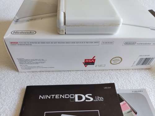 Nintendo Ds lite and box, includes charger