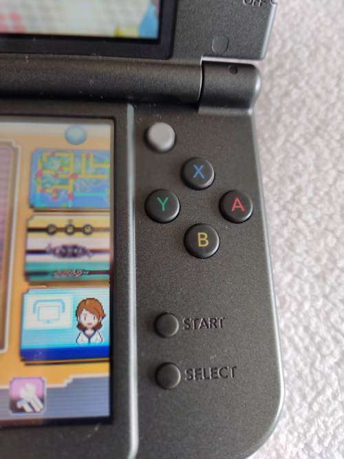 "New" Nintendo 3ds XL with original packaging, charger and stylus