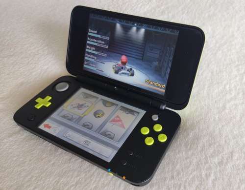 `New` Nintendo 2ds xl with original packaging and charger Mario kart edition