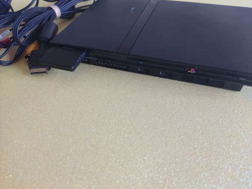 Playstation 2 slim console and cables /please read description
