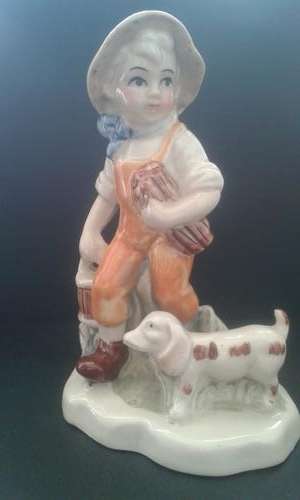 Figurine of Boy Doing Chores With His Dog