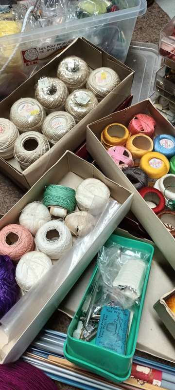 Lifetime collection of crochet, sewing and needlework items.