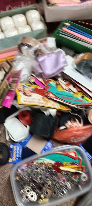 Lifetime collection of crochet, sewing and needlework items.