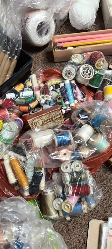 Lifetime collection of crochet, sewing and needlework items.