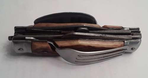 A  vintage multi-tool utility knife with original pouch.  Awesome!!!