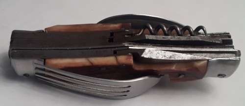A  vintage multi-tool utility knife with original pouch.  Awesome!!!