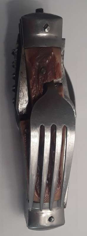 A  vintage multi-tool utility knife with original pouch.  Awesome!!!